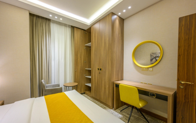 Отель Abraj INN Suites