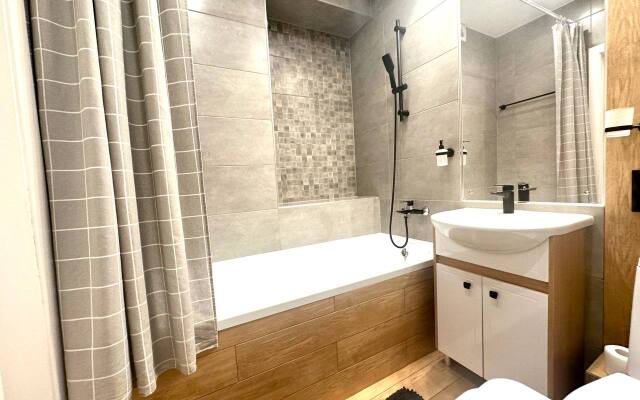 V Novom Dome Flat