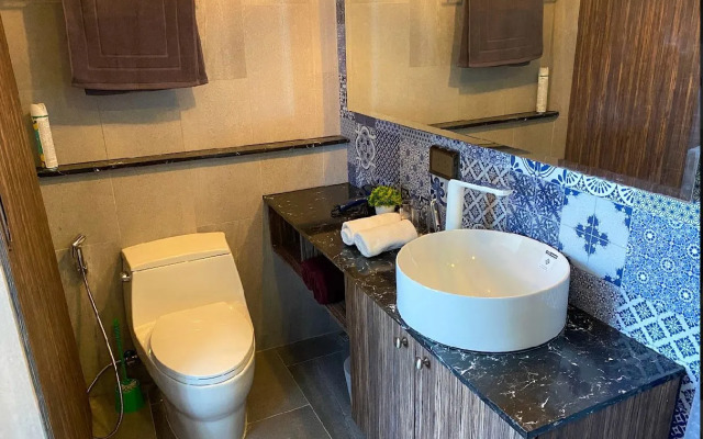 V Komplekse Palmyrah Apartment