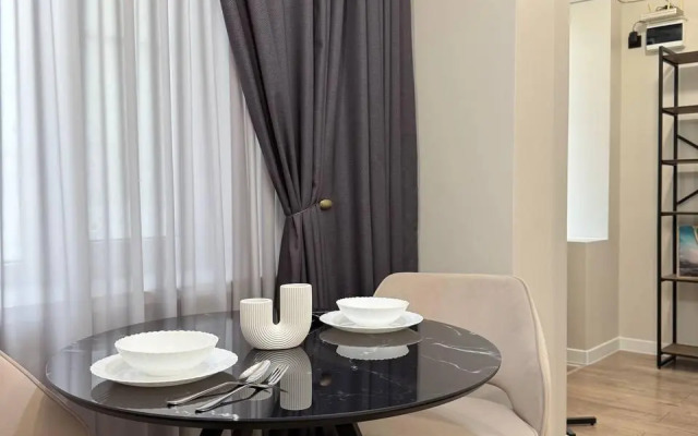 Современная студия в центре Апартаменты