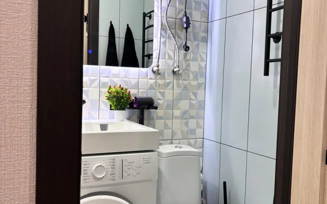 Апартаменты Потрясающая студия напротив терминала в центре Нефтяников