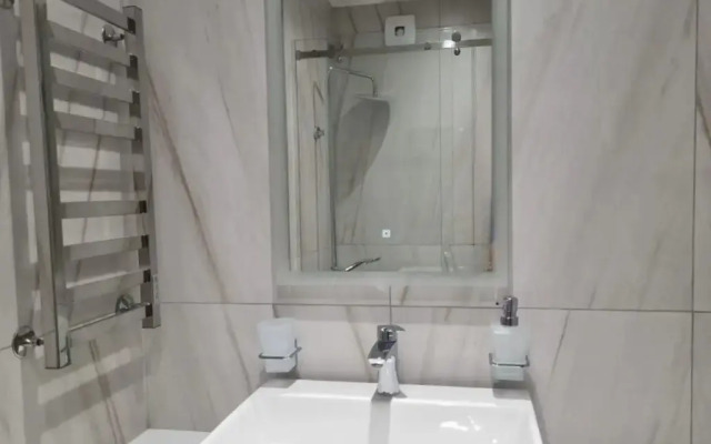 Uyutnaya Studiya s Pryamym Vidom na More Apartments