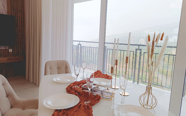 Shikarnye na Beregu Morya Apartment