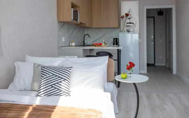 Апартаменты Уютная Студия с Развитой Инфраструктурой