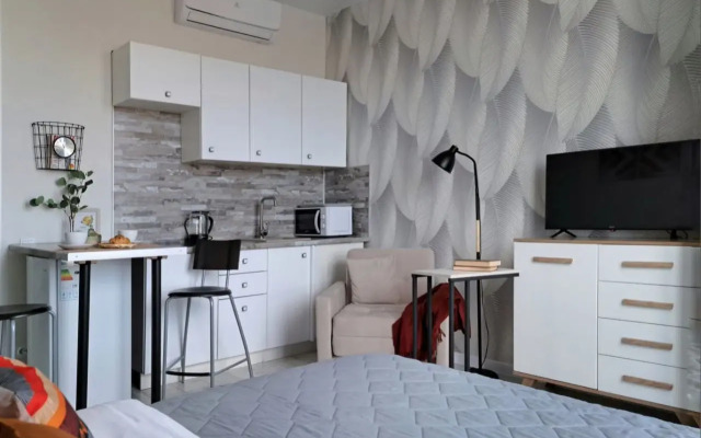 Апартаменты Wing Tower - высотная студия в центре