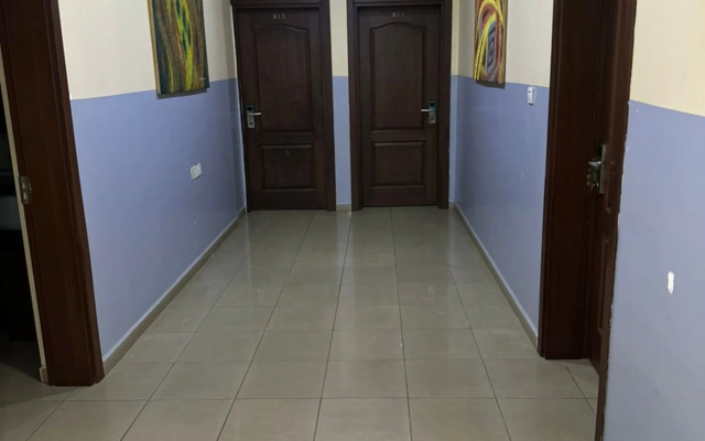 Отель Signatious Suites