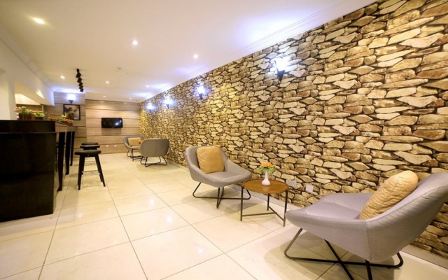 Отель Aries Suites