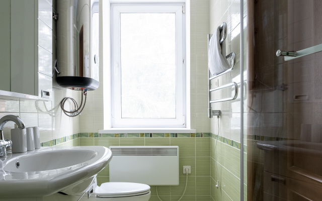 Kottedzh V Lesu Guest House