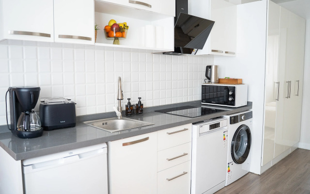 Апартаменты Стильные апартаменты с отдельной спальней у Таксим