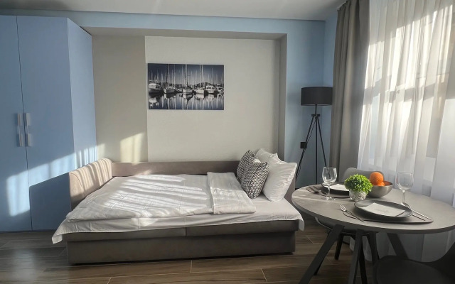 U Chasovoy Bashni Golubye Apartments