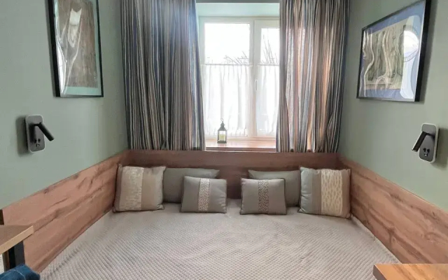 Квартира Уютная студия с теплым полом в самом центре