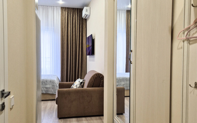 S Vysokimi Potolkami Apartments