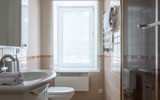 Kottedzh V Lesu Guest House