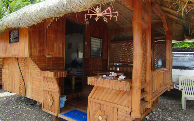 Бунгало Bamboo village on the beach