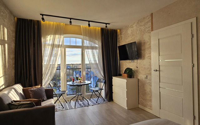 Квартира лофт над елями