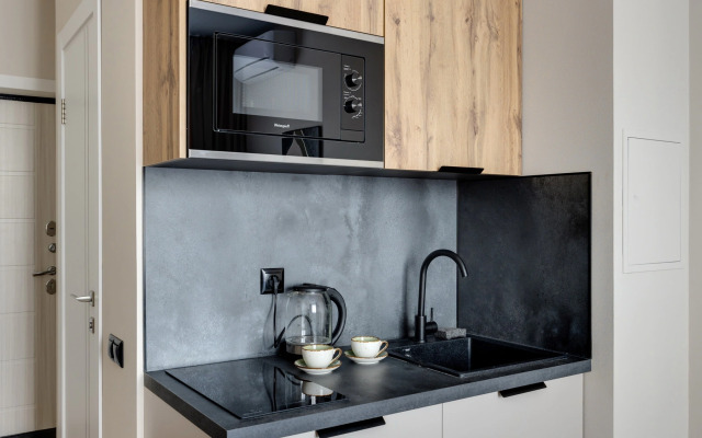 Апартаменты Уютная Студия у Метро Ботанический Сад