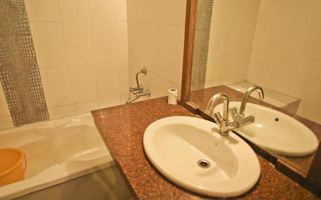 Uttam by Sky Stays Hotel