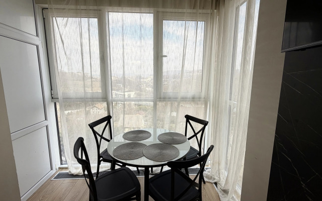 Апартаменты Уютная студия с красивым видом на горы