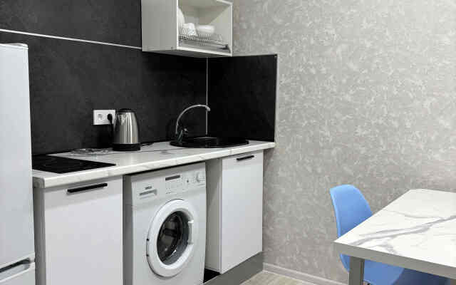 V Tsentre Goroda Apartments