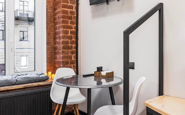 Квартира Уютная двухъярусная студия в центре