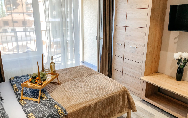 Апартаменты Бежевая кофейная студия у моря