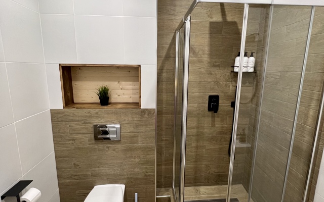 Skandinavskiy uyut na solnechnom kruge Apartaments