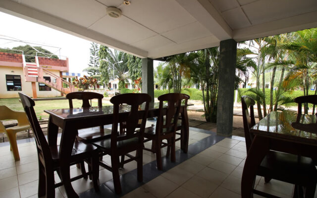 Whispering Palms Hotel and Resort