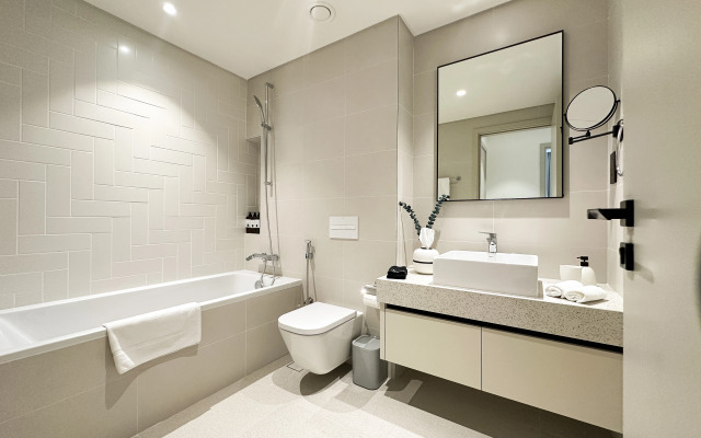 Апартаменты Keyrock Living Seaview Stay at Emaar Beachfront