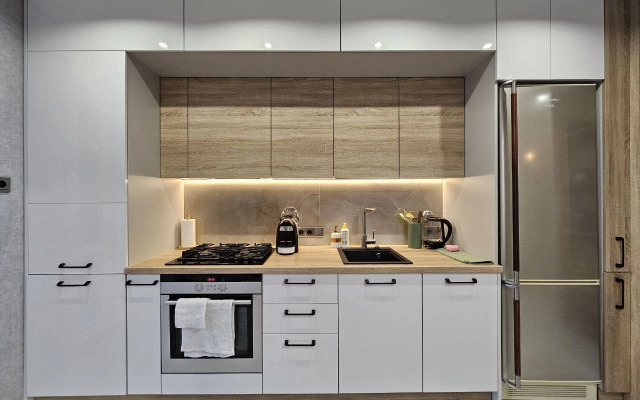 Квартира лофт над елями