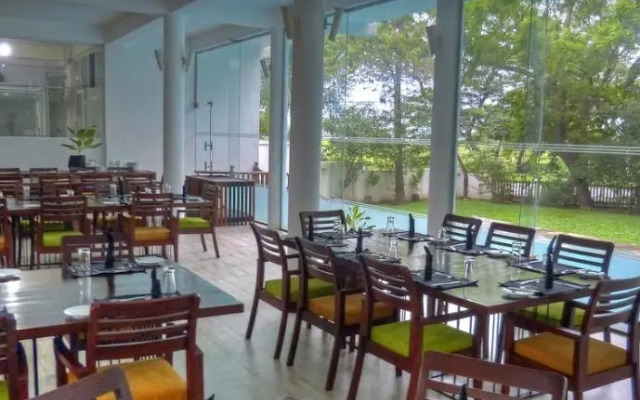 Rain Tree by Oak Ray Hotel