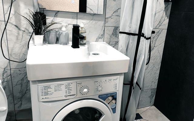 Апартаменты Уютная студия напротив университета и парка в центре Нефтяников