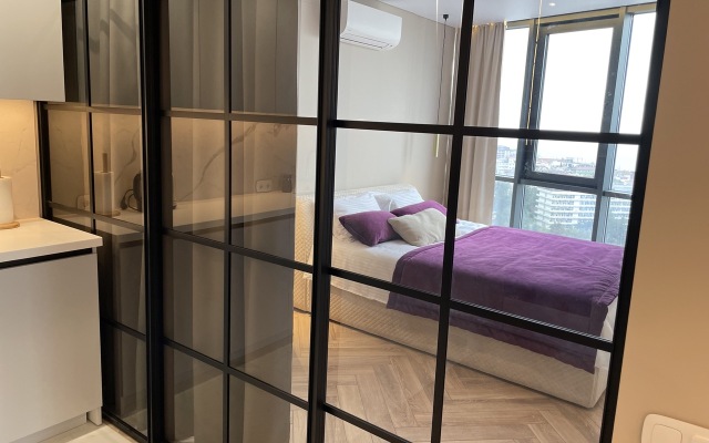 S neveroyatnym vidom na more i zakaty Apartments
