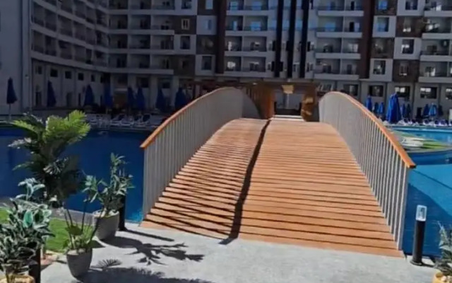 Апартаменты Tiba Golden Resort с личным пляжем