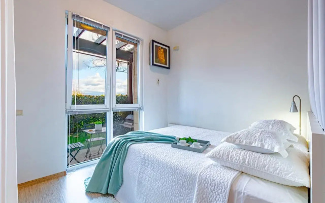 Апартаменты Уютная студия с террасой