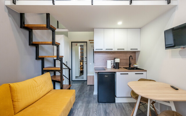 Апартаменты Уютная Двухуровневая Квартира Студия в Центре Города