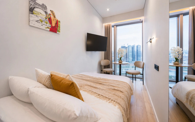 Апартаменты Уникальная панорамная студия с видом на Москва-Сити