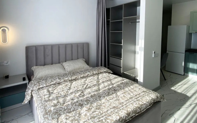 Апартаменты-студия 30 кв.м. с кроватью и балконом, с 13 по 15 этаж