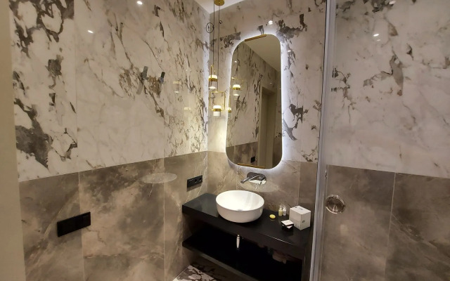 Апартаменты Двухуровневые апартаменты с балконом