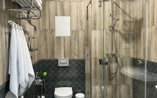 Апартаменты Олива с зоной патио и отдельной спальней