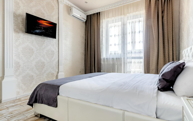 Двухместные апартаменты Luxury с 2 комнатами с балконом и с видом на город — фото 1
