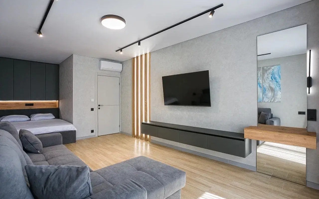 Апартаменты с бассейном в окружении леса и гор