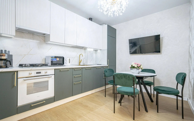 V Tsentre s Parkovkoy Flat