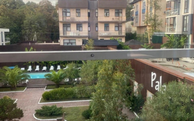 S Balkonom Apartment