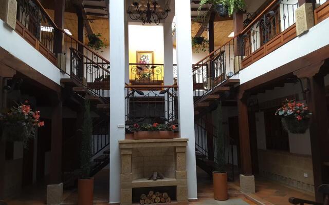 Отель Jardines de la Villa