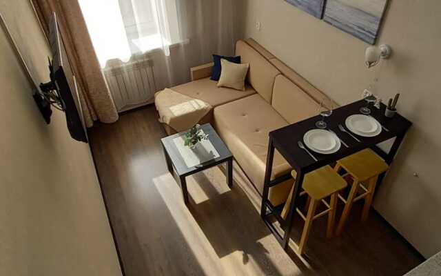 Апартаменты Уютная Двухуровневая Студия в Центре Города