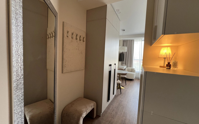 Квартира Эстетичная студия с панорамными окнами рядом с метро