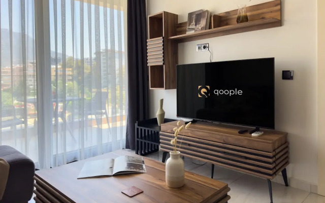 Апартаменты 1+1 Qoople Cebeci Towers C-10 с видом на горы