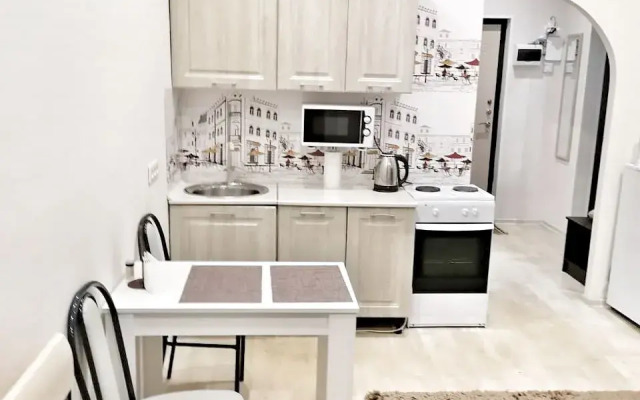 Квартира Уютная студия рядом с ТРЦ АУРА