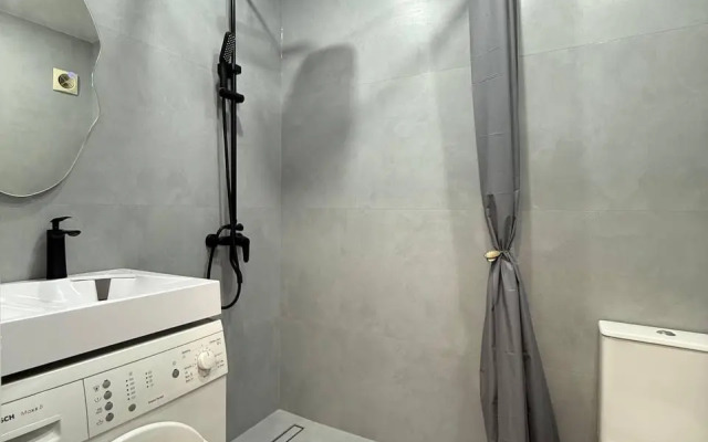 Современная студия в центре Апартаменты