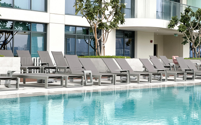 Апартаменты Keyrock Living Seaview Stay at Emaar Beachfront